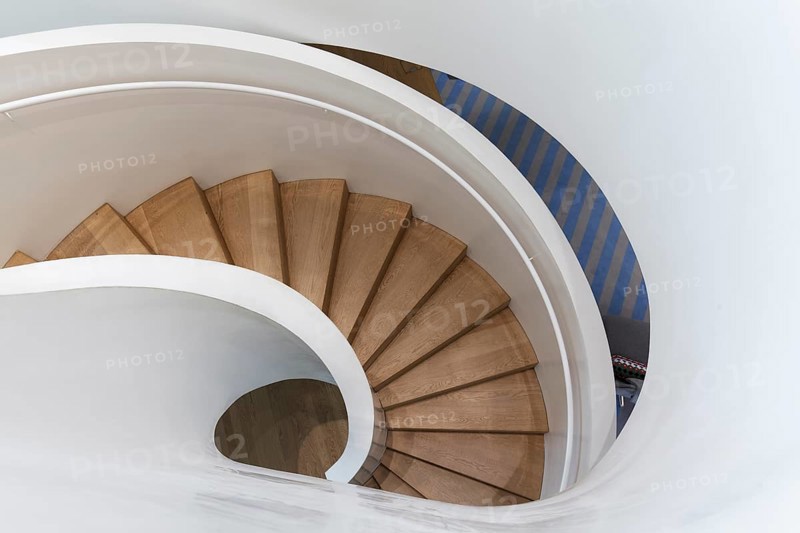 Modern spiral staircase in Vitra Haus, wooden steps, architects Herzog & de Meuron, Vitra Campus, Weil am Rhein, Baden-Württemberg, Germany, Europe