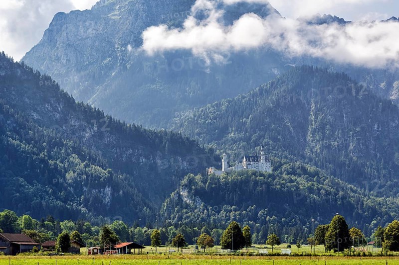 Neuschwanstein Castle in the morning mist, summer, Schwangau, Ostallgäu, Allgäu, Swabia, Upper Bavaria, Bavaria, Germany, Europe