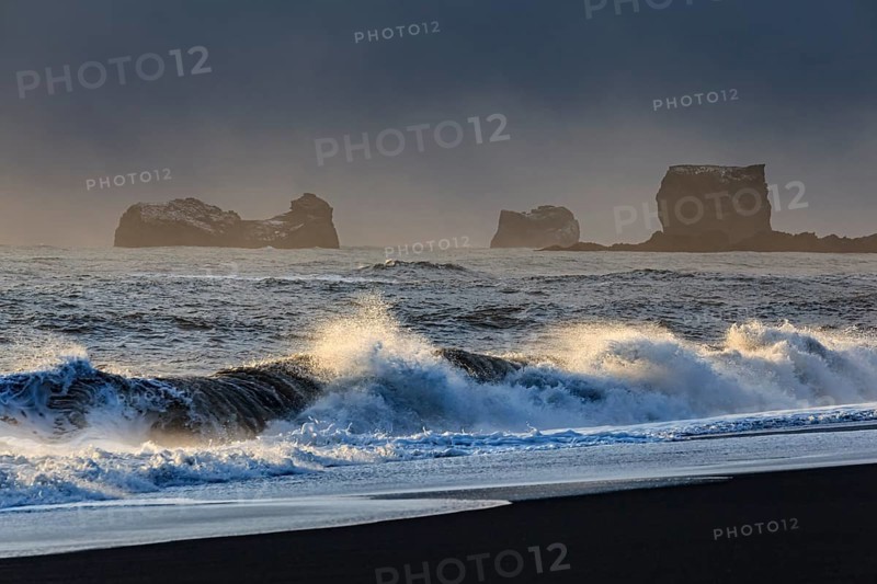 Snowy beach, waves, wind, dark clouds, winter, light mood, rocks, Dyrholaey, Vik, Iceland, Europe