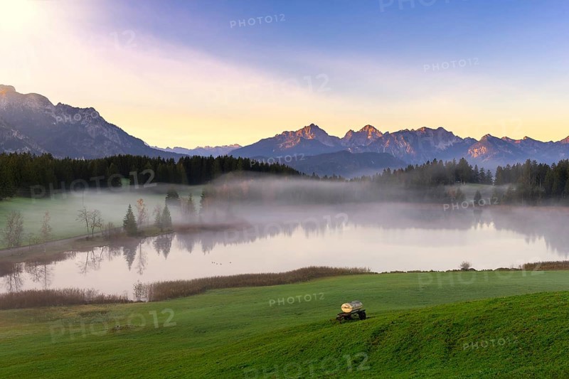 Mountain landscape with lake in the morning mist, clear atmosphere and soft lighting, Hegratsrieder See near Füssen, Ostallgäu, Allgäu, Bavaria, Germany, Europe