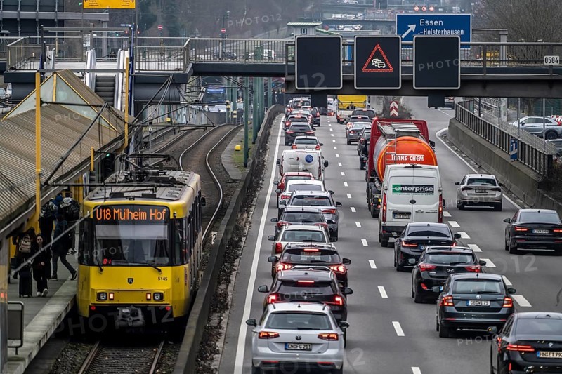 Traffic jam on the A40 motorway, in both directions, underground U18 in the middle lane, Friday, rush hour, view to the west, Essen, North Rhine-Westphalia, Germany, Europe