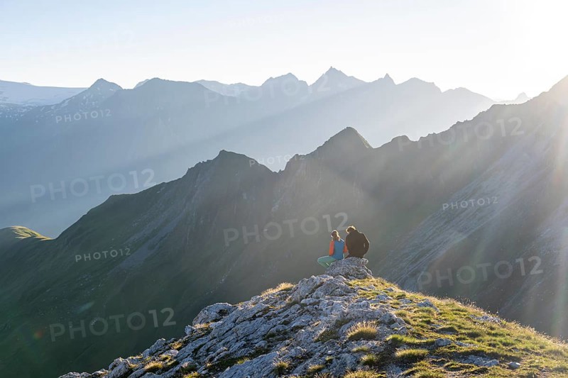 Hiker enjoying the mountain panorama in the morning, Venedigergruppe, Hohe Tauern, Austria, Europe