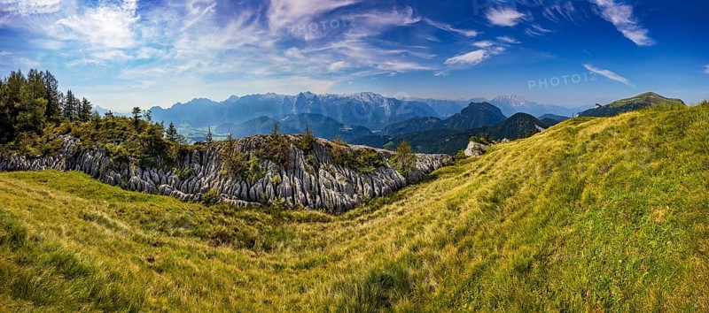 At the summit of Alpbichl with a view of the Lammertal and Tennengebirge mountains, Osterhorn group, Salzkammergut, Salzburg province, Austria, Europe