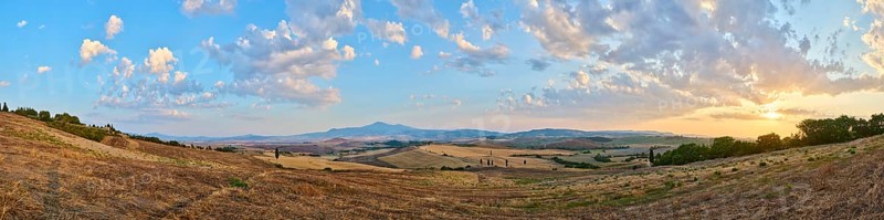 Typical Tuscan landscape in Val d'Orcia with hills, trees, fields, cypresses and farm road in autumn, sunset, gladiator film location, San Quirico d'Orcia, Val d'Orcia, Orcia Valley, UNESCO World Heritage Site, Siena Province, Tuscany, Italy, Europe