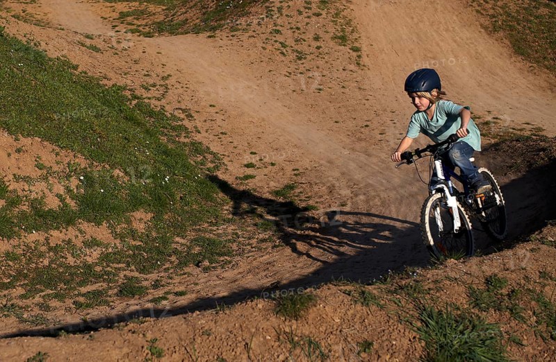Little boy, 5 years, blond, rides with bicycle, crash helmet, cross, cross track, playground, Stuttgart, Baden-Württemberg, Germany, Europe