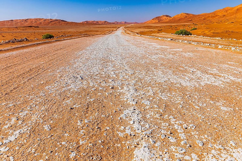 Wide road leads through the Rub al Khali desert, Dhofar province, Arabian Peninsula, Sultanate of Oman