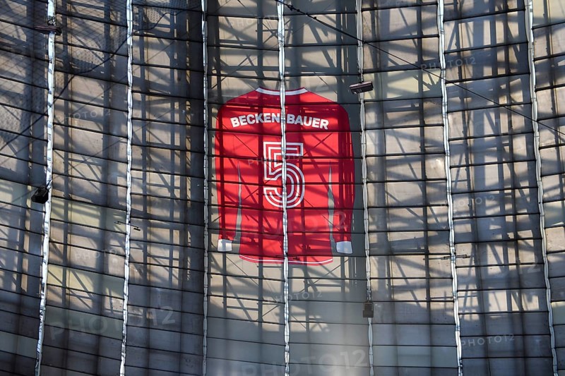 Larger-than-life jersey of Franz Beckenbauer with shirt number 5 hanging in the grandstand roof of the south curve, 125th anniversary of FC Bayern Munich FCB, Allianz Arena, Munich, Bavaria, Germany, Europe