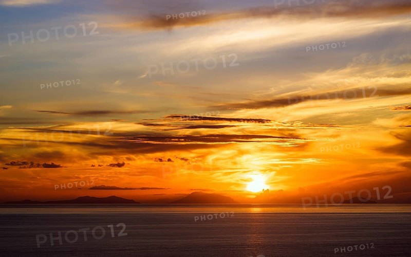 Sunset over Aeolian Islands from Nicotera, Aeolus, Sicily, Tyrrhenian Sea, Italy, Europe