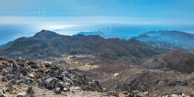 View from the summit of Kali Limno over the rocky mountain landscape of southern Karpathos with the sea under a clear blue sky, hike to the summit of Kali Limni, Kali Limni, Lastos, Karpathos, Greece, Europe