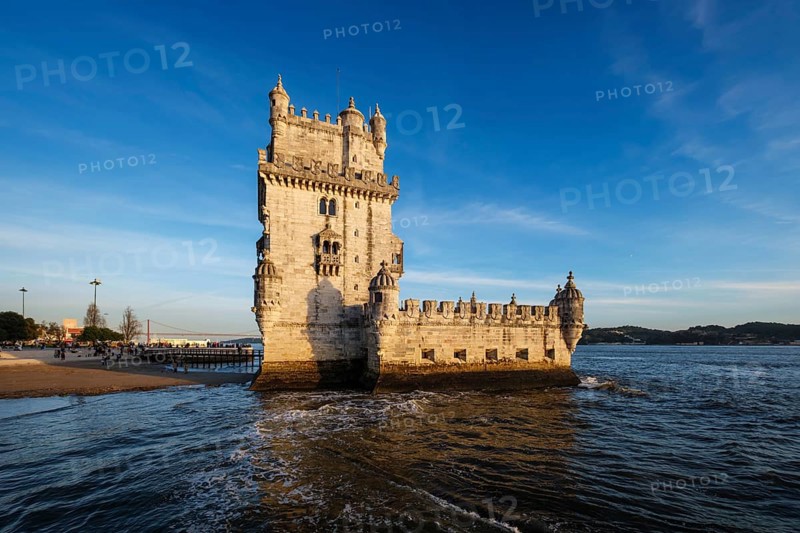 Belem Tower or Tower of St Vincent, famous tourist landmark of Lisboa and tourism attraction, on the bank of the Tagus River Tejo on sunset. Lisbon, Portugal, Europe
