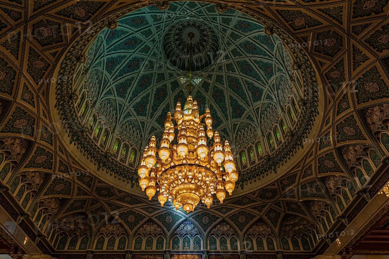Dome and illuminated chandelier in the Sultan Qaboos Mosque, Muscat, Arabian Peninsula, Sultanate of Oman