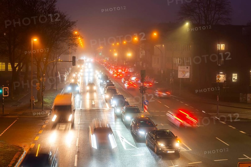 Dense fog, with visibility sometimes less than 100 metres, city centre traffic at rush hour on Alfredstraße, B224, in Essen, North Rhine-Westphalia, Germany, Europe