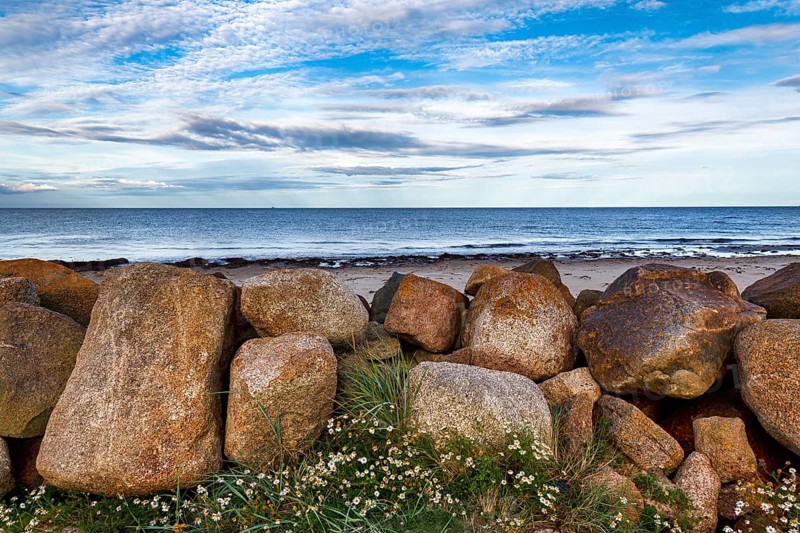 Coastal defence, boulders overlooking the sea, dusk, Carne Beach, Wexford, Gerrans Bay, Roseland Peninsula, Ireland, Europe