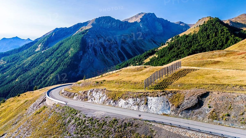 Route des Grandes Alpes, aerial view of road and mountains at pass Col de Vars, Départements Hautes-Alpes and Alpes-de-Haute-Provence, Alps, France, Europe