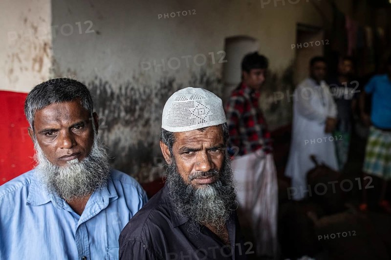 Traders in front of their shop at Sadarghat, river quay at Buriganga, Dhaka, Bangladesh, Asia