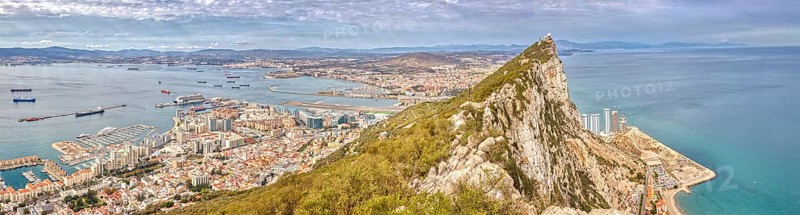 Panoramic view of the city and harbour with a striking rock in the centre, Gibraltar, Europe