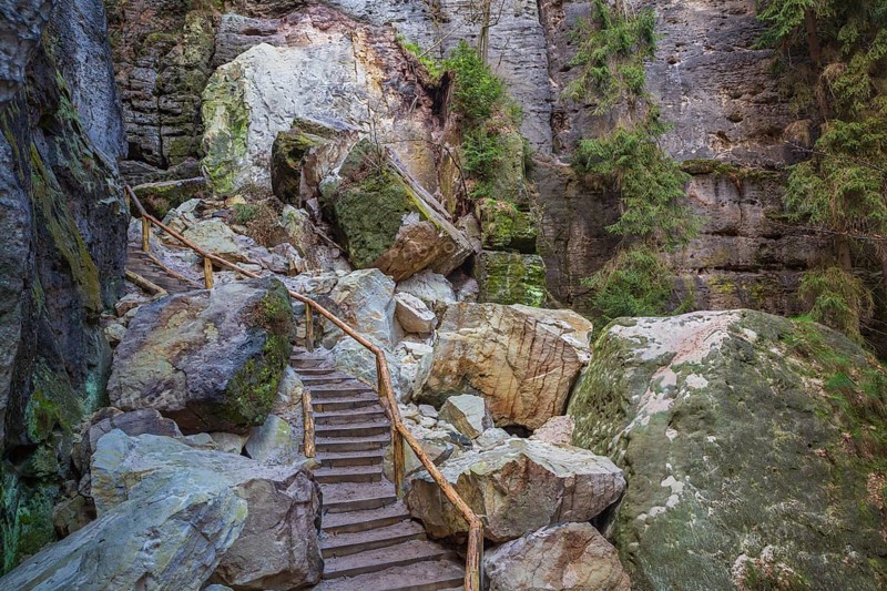 Stairway at the Schwedenlöcher, a narrow gorge of the Amselgrund near the village of Rathen in Saxon Switzerland National Park, Saxony, Germany, Europe