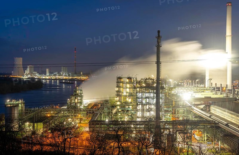 The Schwelgern coking plant supplies over 2.5 million tonnes of coke to Thyssenkrupp Steel's Schwelgern blast furnace plant on the Rhine, considered the most modern coking plant in the world with the world's largest coke oven batteries, on the left the so-called white side, a chemical factory that generates many by-products from the coking process, in the background the STEAG combined heat and power plant Duisburg-Walsum, North Rhine-Westphalia, Germany, Europe