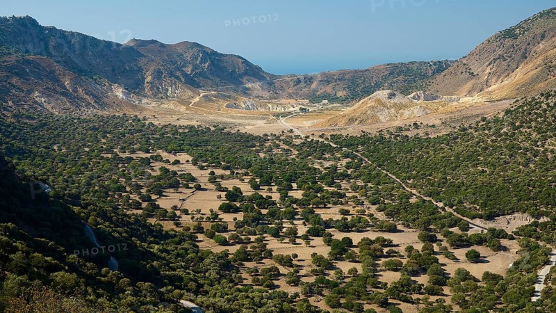 Panoramic view of a green valley surrounded by high mountains and blue sky, volcanism, volcanic island, access to the crater, Nisyros, Dodecanese, Greek Islands, Greece, Europe