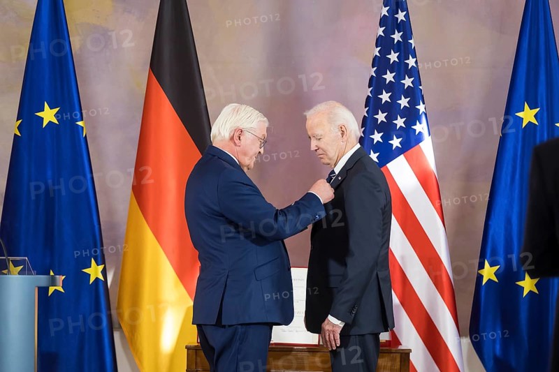 Joe Biden (46th President of the United States) receives the special grade of the Grand Cross from Frank-Walter Steinmeier (President of the Federal Republic of Germany) at Bellevue Palace, Berlin, 18 October 2024