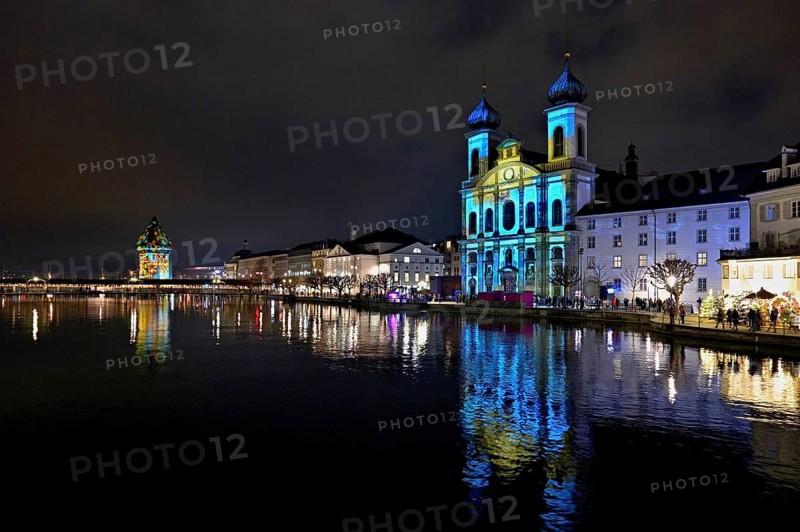 Water tower and Jesuit church on the right with light installation, on the Reuss at dusk, Old Town, Lilu, Light Festival 2025, Lucerne, Canton of Lucerne, Switzerland, Europe