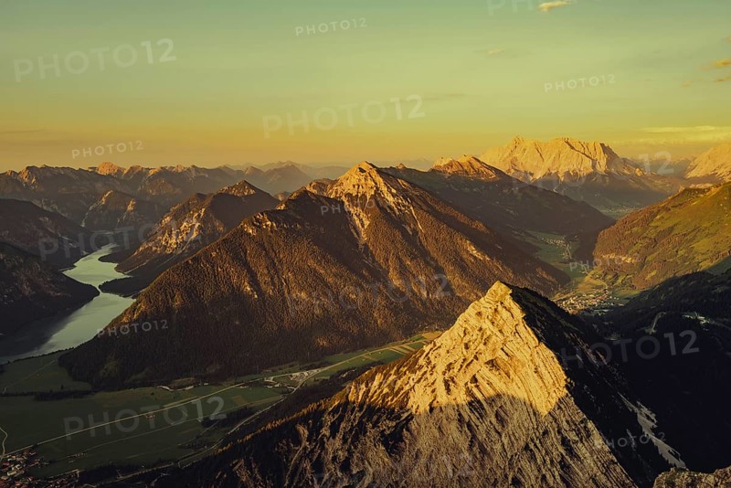 Thaneller summit at sunset in the Lechtal valley in Tyrol with a wonderful view of the surrounding mountains. Tyrol, Austria, Europe