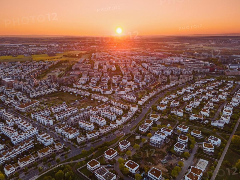 The sun rises over the Riedberg district of Frankfurt. (Aerial view with a drone), Riedberg, Frankfurt am Main, Hesse, Germany, Europe