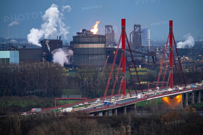 Thyssenkrupp Steel steelworks, blast furnaces 8 and 9, gasometer, motorway bridge of the A42 over the Rhine near Duisburg Beeckerwerth, Duisburg, North Rhine-Westphalia, Germany, Europe