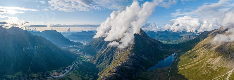 View of the valleys Romsdalen and Venjesdalen, river Rauma, mountain Romsdalseggen, Åndalsnes, Møre og Romsdal, Norway, Europe