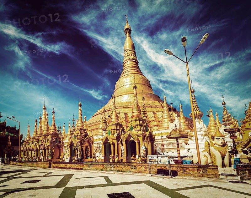 Vintage retro effect filtered hipster style image of Myanmer famous sacred place and tourist attraction landmark, Shwedagon Paya pagoda. Yangon, Myanmar, Asia