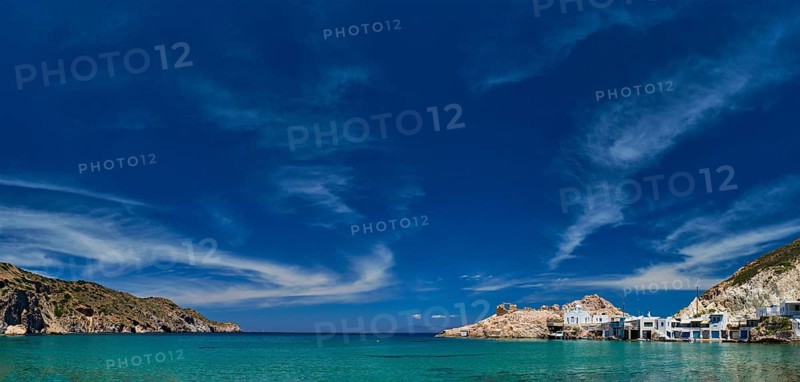 Panorama of the beach and fishing village of Firapotamos in Milos island, Greece, Europe