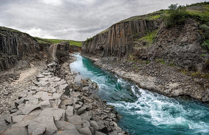 Stuðlagil Canyon, turquoise river between basalt columns, Egilsstadir, Iceland, Europe