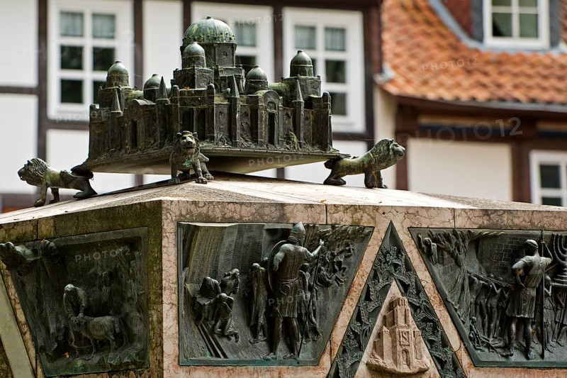 Bronze sculpture with a miniature of the city of Jerusalem on the ashlar of the synagogue memorial, Hildesheim, Lower Saxony, Germany, Europe