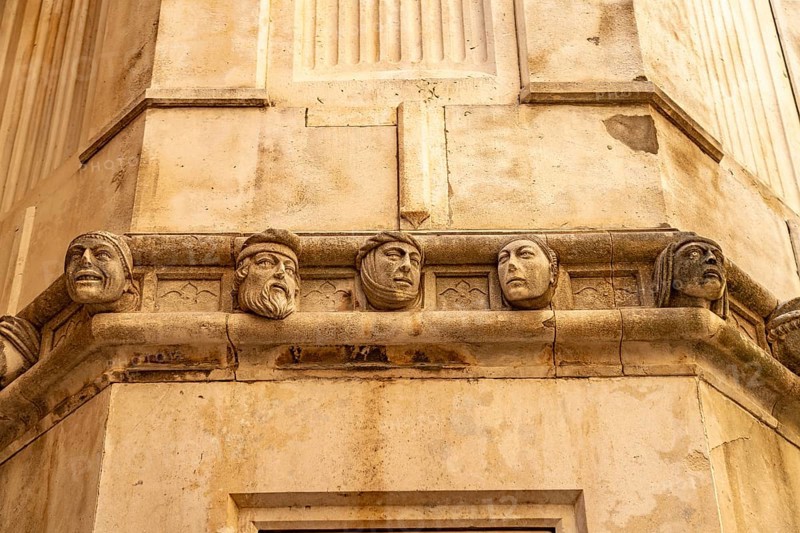 Famous heads on the façade of the Cathedral of St James, UNESCO World Heritage Site in Sibenik, Croatia, Europe