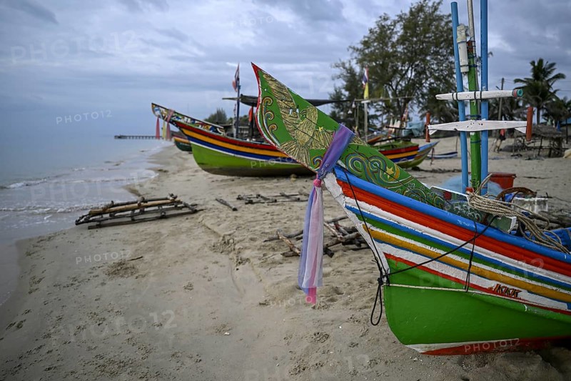 Fishing boats on the beach of Chathing Phra, near Hat Yai, Songkhla province, Thailand, Asia