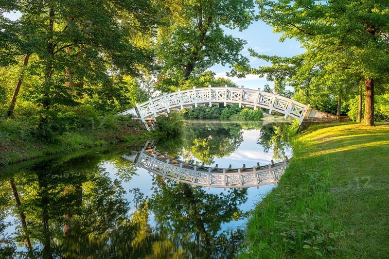 The Chinese or White Bridge in Wörlitz Park in the evening light, Garden Kingdom Dessau-Wörlitz, Wörlitz, Saxony-Anhalt Germany
