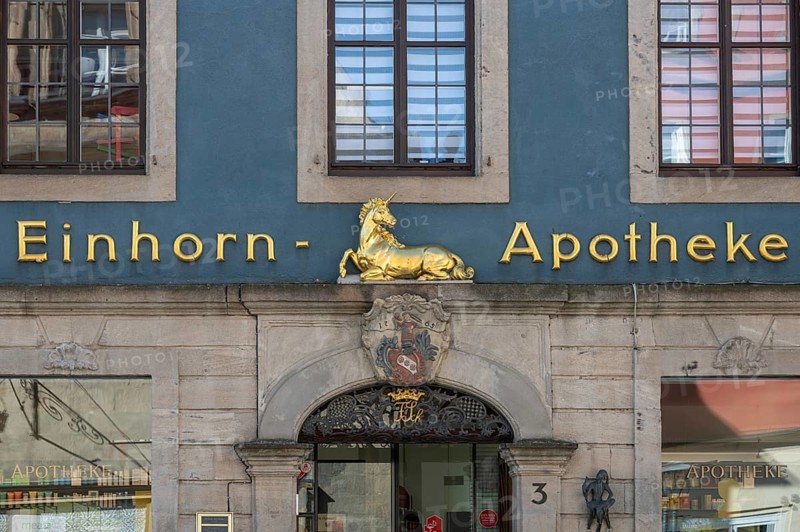 Coat of arms and unicorn figure from the entrance portal of the unicorn pharmacy, 17th century, Rosenstraße 3, Middle Franconia, Bavaria, Germany, Europe
