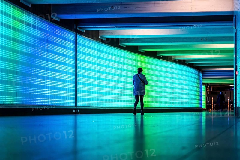 Passage under Essen's main railway station, connects entrances to the city and the main railway station, with the underground station, illuminated, LED wall, few people, Germany, Europe