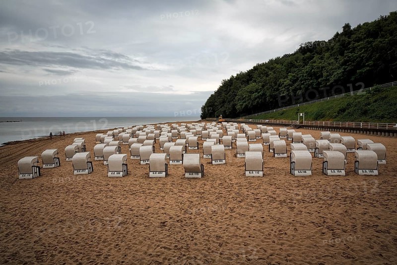 Rainy weather at the Baltic Sea, empty beach chairs, single walkers, view from above, long exposure, Baltic resort Sellin, Rügen Island, Mecklenburg-Western Pomerania, Germany, Europe