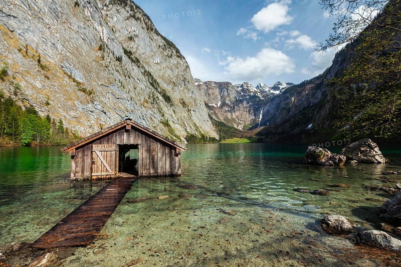 Boat shed dock on Obersee lake. Bavaria, Germany, Europe