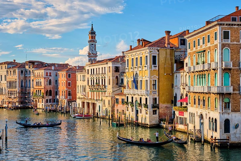 VENICE, ITALY, JUNE 27, 2018: Grand Canal with boats and gondolas on sunset, Venice, Italy, Europe