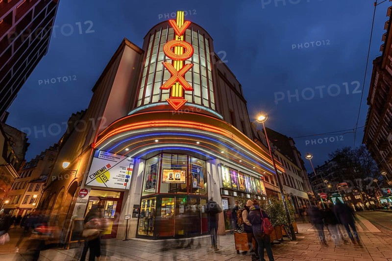 The Vox cinema in Strasbourg is illuminated at night. Bas-Rhin, Alsace, Grand Est, France, Europe