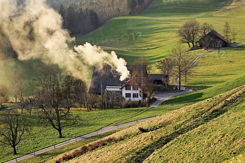 Farmhouse with smoking chimney, Hirzel, Canton Zurich, Switzerland, Europe
