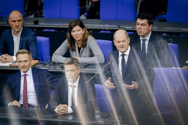 (L-R) Christian Lindner (FDP), Federal Minister of Finance, Robert Habeck (Alliance 90/The Greens), Federal Minister of Economics and Climate Protection and Vice-Chancellor, and Olaf Scholz (SPD), Federal Chancellor, during a government enquiry in the German Bundestag. Berlin, 15 November 2023, Berlin, Germany, Europe