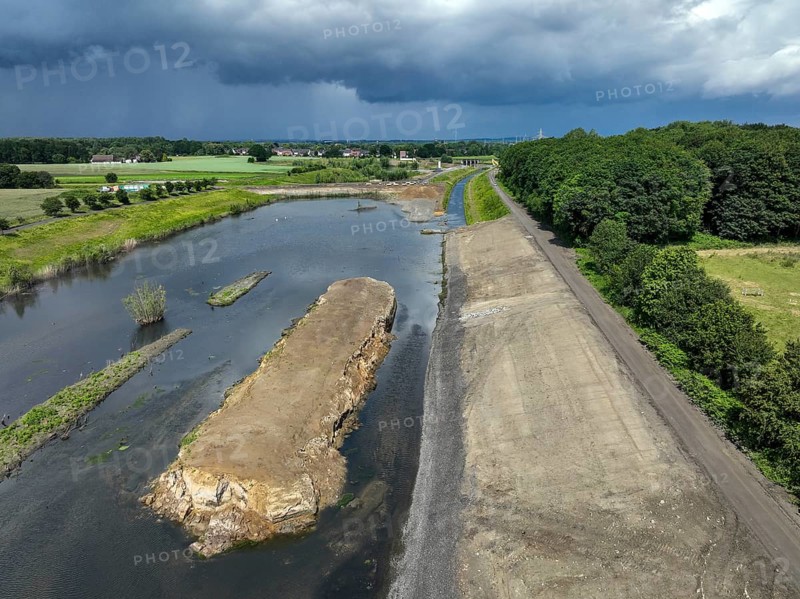 Dortmund / Castrop-Rauxel, North Rhine-Westphalia, Germany, river renaturalisation, renaturation of the Emscher, flood retention basin HRB Mengede. A new floodplain landscape is being created at the Emscher-Auen farm, expanding the area for flood protection during heavy rainfall and for biodiversity. The Emscher, which is currently straightened, will be given curves again and can meander through its new floodplain. Following the construction of a parallel sewer, the Emscher has been completely free of wastewater since 2022. The river was previously an open, above-ground combined sewer with rainwater and wastewater, Europe
