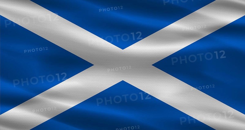 Scottish flag with fabric texture. Realistic flag of Scotland waving