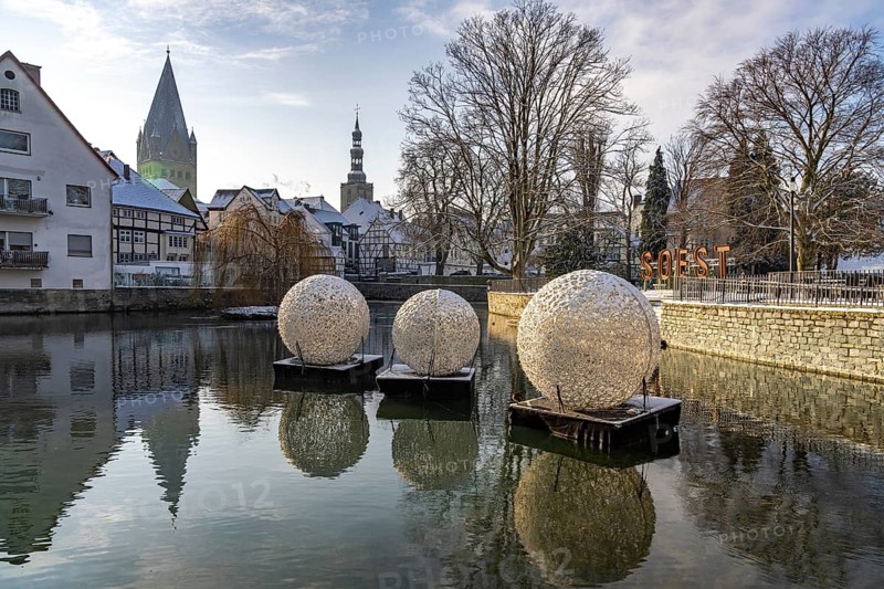 City view with decorative baubles and Soest lettering on the large pond in Soest, North Rhine-Westphalia, Germany, Europe