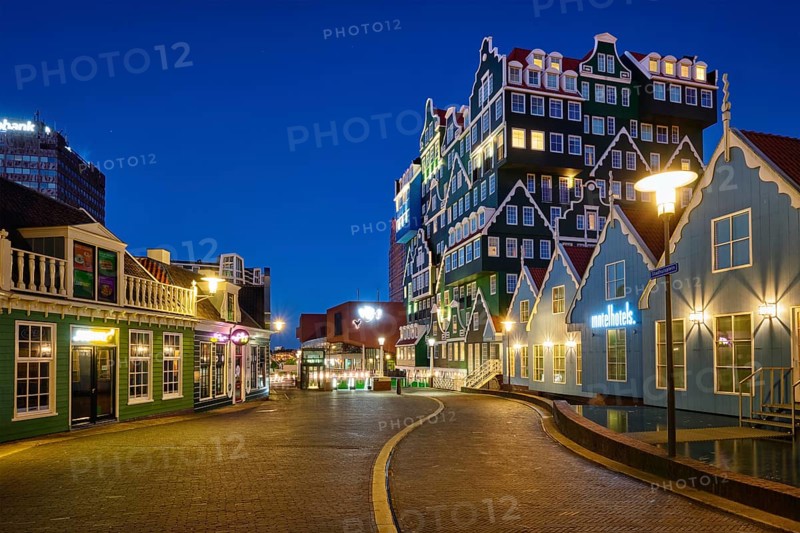 ZAANDAM, NETHERLANDS, MAY 8, 2017: Inntel Hotel in Zaandam illuminated at night. Design of 12-storey tall building opened in 2009 is the result of stacking a series of traditional Dutch houses