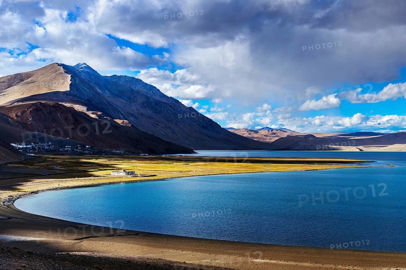 Himalayan lake Tso Moriri and Korzok village in Himalayas on sunset, Ladakh, India, Asia