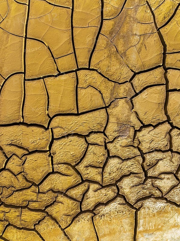 Mineral-rich cracked earth at the bank of the Rio Tinto (Red river), aerial view, drone shot, Huelva province, Andalusia, Spain, Europe